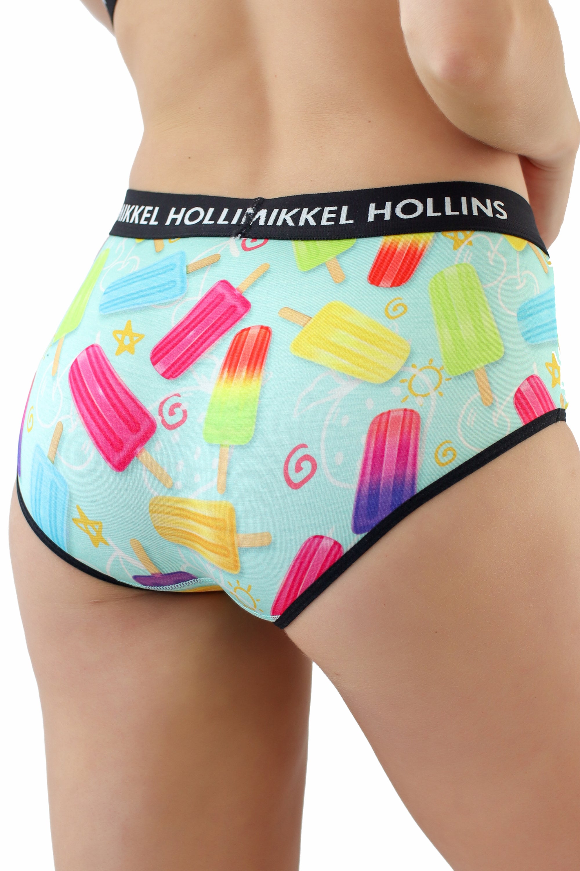 Colorful popsicles next to a collection of stylish hipster panties showcasing vibrant summer fashion trends.